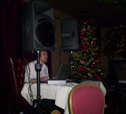 Mobile D.J. and Karaoke entertainer Mark Perna at a Holiday Party in Orange County California.  Birthday party and coprorate event music dee jay